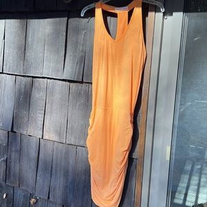 NWOT Athleta size small razor back ruched dress. Cantaloupe color. Gorgeous.